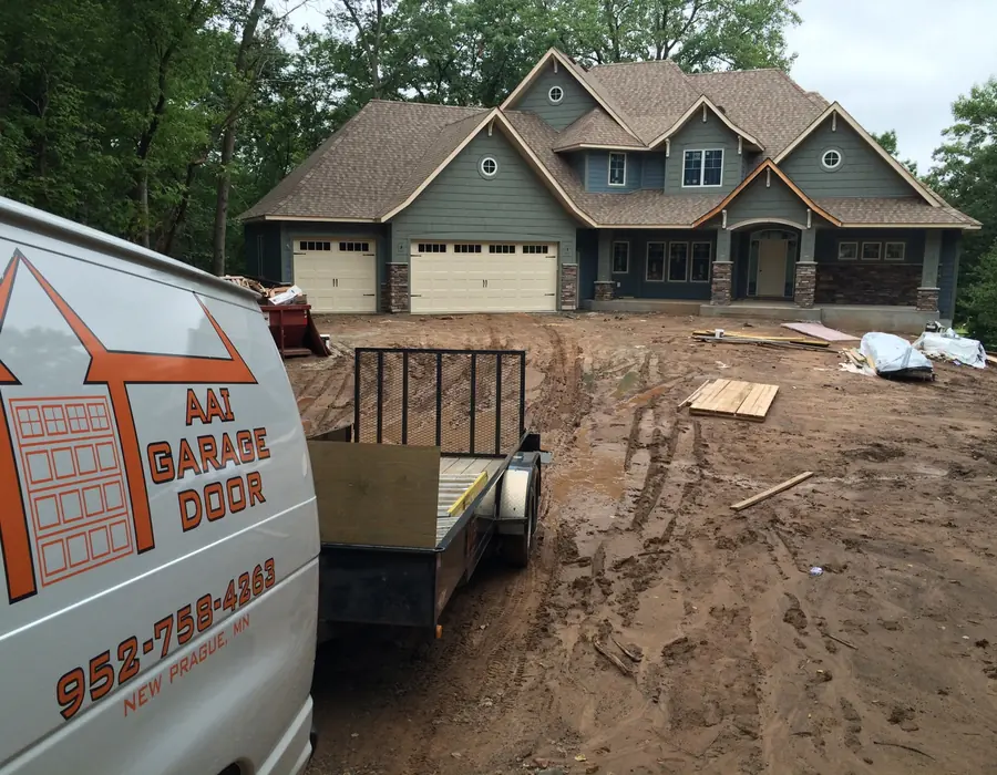 AAI Garage Door service vehicle at a residential garage project